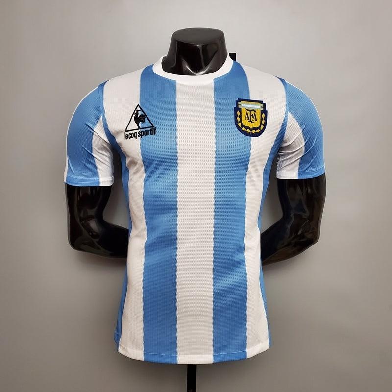 Camisa Argentina Retrô 1986 Azul e Branca - Le Coq Sportif - Loja da Seven Oficial