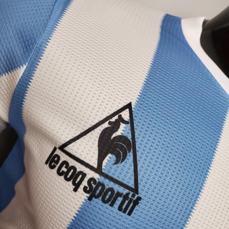 Camisa Argentina Retrô 1986 Azul e Branca - Le Coq Sportif - Loja da Seven Oficial